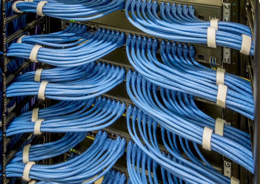 ICT Cables going into the back of a data centre server